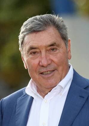 Belgian cycling legend Eddy Merckx arrives on the presentation podium after the Tour de France in Paris on July 29, 2018. Geraint Thomas claimed his first Tour de France victory, becoming the first Welshman to win the event.  PAR20180729020 DAVIDxSILPA