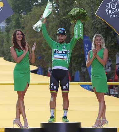 Peter Sagan of Slovakia arrives on the presentation podium after winning the Green Jersey (overall points leader) at the Tour de France in Paris on July 29, 2018. Geraint Thomas claimed his first Tour de France victory, becoming the first Welshman to win the event.  PAR20180729029 DAVIDxSILPA