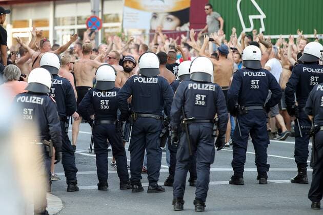 SOCCER - UEFA CL quali, Sturm vs Ajax GRAZ,AUSTRIA,01.AUG.18 - SOCCER - UEFA Champions League qualification, SK Sturm Graz vs AFC Ajax Amsterdam. Image shows fans of Ajax and police. GEPAxpictures xChristianxWalgram