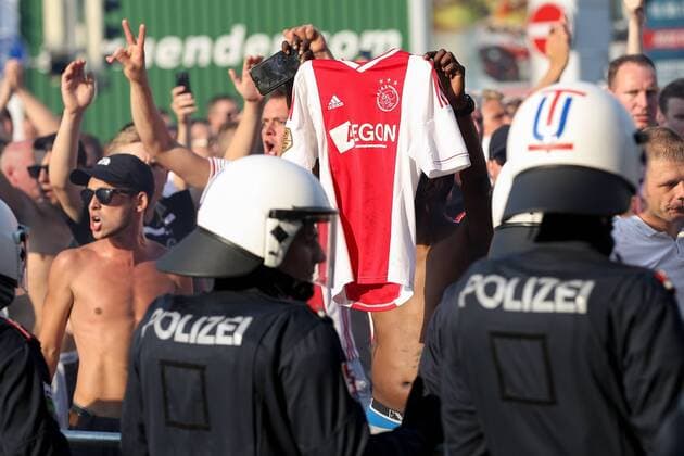 SOCCER - UEFA CL quali, Sturm vs Ajax GRAZ,AUSTRIA,01.AUG.18 - SOCCER - UEFA Champions League qualification, SK Sturm Graz vs AFC Ajax Amsterdam. Image shows fans of Ajax and police. GEPAxpictures xChristianxWalgram