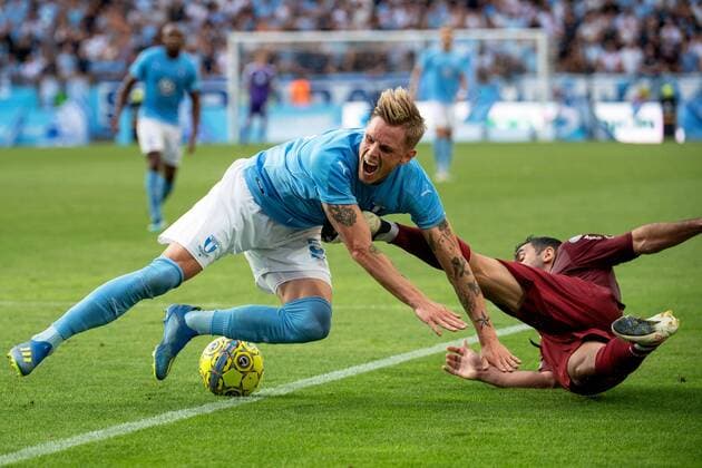 180801 Sören Rieks of Malmö FF and Juan Culio of Cluj during the UEFA Champions League qualifying match between Malmö FF and Cluj on August 1, 2018 in Malmö. Photo: Ludvig Thunman BILDBYRAN kod LT 35511 Copyright: LUDVIGxTHUNMAN BB180801LT022