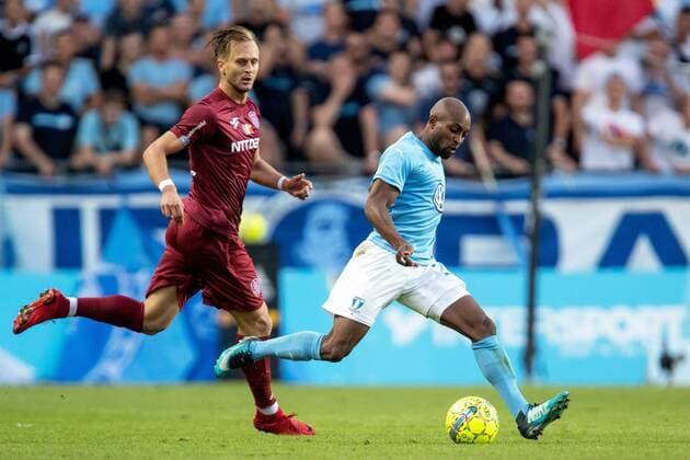 180801 Damjan Äokovic of Cluj and Fouad Bachirou of Malmö FF during the UEFA Champions League qualifying match between Malmö FF and Cluj on August 1, 2018 in Malmö. Photo: Mathilda Ahlberg BILDBYRAN Cop 178 Copyright: MATHILDAxAHLBERG BB180801MA024