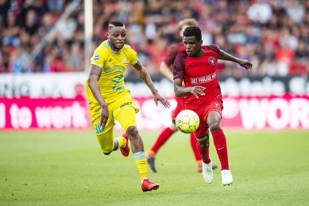Junior Kabananga ( 30 - FC Astana ) in action with Frank Onyeka ( 38 - FC Midtjylland ) during UEFA Champions League, Second Qualifying Round between FC Midtjylland and FC Astana, August 1, 2018 in ARENA Herning, Denmark. Photo: Bo Amstrup Ritzau Scanpix , Herning Denmark  Copyright: BoxAmstrup BoxAmstrupx cop103 spdk20180801-213637-L