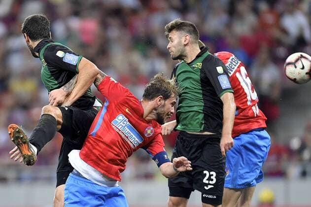 FCSB - NK Rudar Velenje FCSB s Mihai Balasa, center, in action against NK Rudar Velenje s Josip Tomasevic during FCSB - NK Rudar Velenje - UEFA Europa League 2018 2019, Second Qualifying Round: 2st leg, National Arena, Bucharest, Romania, 02 August 2018 Copyright: xAlexxNicodimx