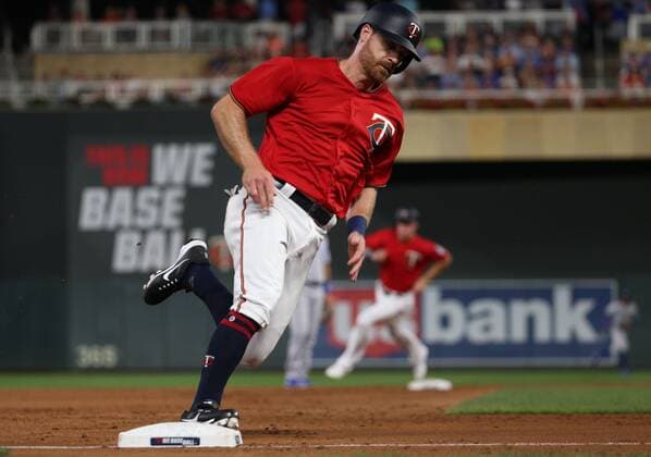 August 3, 2018 - Minneapolis, MN, USA - The Minnesota Twins Logan Forsythe rounds third base and heads for home on a two-run double by Miguel Sano in the second inning against the Kansas City Royals on Friday, Aug. 3, 2018, at Target Field in Minneapolis. Kansas City at Minnesota - ZUMAm67_ 20180803_zaf_m67_028 Copyright: xAlexxKormannx
