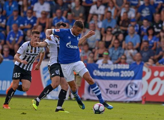 SOCCER, Schalke vs Angers, test match MITTERSILL,AUSTRIA,43317 - SOCCER - 1. DFL, 1. Deutsche Bundesliga, Ligue 1, FC Schalke 04 vs Angers SCO, friendly match. Image shows Pierrick Capelle, Thomas Mangani (Angers) and Franco Di Santo (Schalke). GEPAxpictures xHansxOsterauer