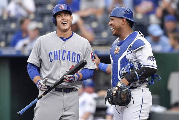August 6, 2018 - Kansas City, MO, USA - Kansas City Royals catcher Salvador Perez jokes with Chicago Cubs Anthony Rizzo before his first at bat in the first inning during Monday s baseball game on Aug. 6, 2018 at Kauffman Stadium in Kansas City, Mo. Royals vs Cubs - ZUMAm67_ 20180806_zaf_m67_018 Copyright: xJohnxSleezerx