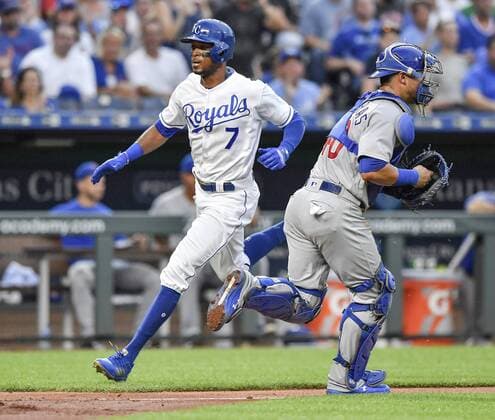 August 6, 2018 - Kansas City, MO, USA - Kansas City Royals Rosell Herrera scores behind Chicago Cubs catcher Willson Contreras on a single by Alcides Escobar in the second inning during Monday s baseball game on August 6, 2018 at Kauffman Stadium in Kansas City, Mo. Royals vs Cubs - ZUMAm67_ 20180806_zaf_m67_025 Copyright: xJohnxSleezerx