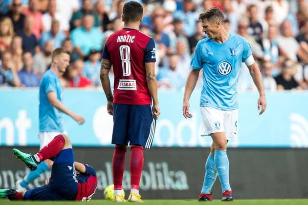 180807 Markus Rosenberg of Malmö FF reacts against Boban Nikolov of Vidi during the UEFA Champions League qualifying match between Malmö FF and Vidi on August 7, 2018 in Malmö. Photo: Mathilda Ahlberg BILDBYRN Cop 178 Copyright: MATHILDAxAHLBERG BB180807MA023