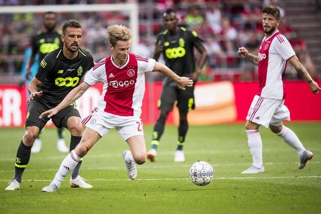 LIEGE, Standard Luik - Ajax, 7-8-2018, football, season 2018-2019, third round qualification match for Champions League, Maurice Dufrasne stadium, Ajax player Frenkie de Jong (M), Standard Liege player Orlando Sa (L) Standard Luik - Ajax  x2382432x