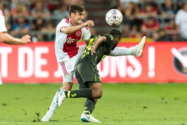 (L-R) Nico Tagliafico of Ajax, Mehdi Carcela of Standard Luik during the UEFA Champions League third round qualifying first leg match between Royal Standard de Liege and Ajax Amsterdam at Stade Maurice Dufrasne on August 07, 2018 in Liege, Belgium UEFA Champions League 2018 2019 xVIxVIxImagesx xGerritxvanxKeulenxIVx 11706400