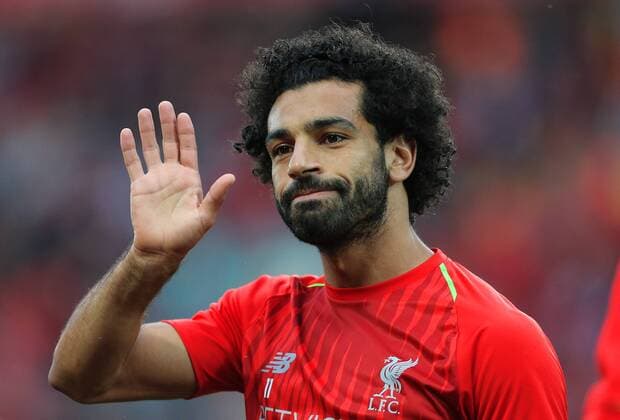 Sport Bilder des Tages Liverpool s Mohamed Salah waves to fans during the pre-season friendly match at Anfield Stadium, Liverpool. Picture date 7th August 2018. Picture credit should read: Matt McNulty Sportimage EDITORIAL USE ONLY. No use with unauthorised audio, video, data, fixture lists, club league logos or live services. Online in-match use limited to 120 images, no video emulation. No use in betting, games or single club league player publications.