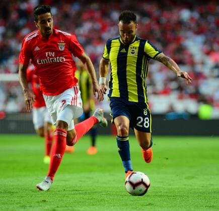 Andre Almeida (L) of Benfica and Mathieu Valbuena (R) of Fenerbahce during the Champions League Qualifying 3rd Round first leg match between Benfica and Fenerbahce at Estadio da Luz Stadium in Lisbon , Portugal on August 07 , 2018. 