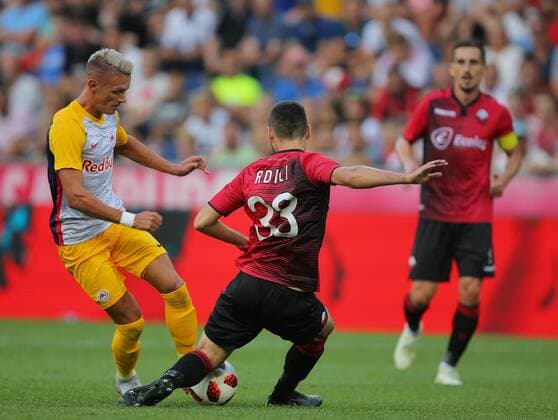 SOCCER - UEFA CL quali, RBS vs Shkendija SALZBURG,AUSTRIA,08.AUG.18 - SOCCER - UEFA Champions League, qualification, Red Bull Salzburg vs KF Shkendija. Image shows Hannes Wolf (RBS) and Mevlan Adili (Shkendija). GEPAxpictures xThomasxBachun