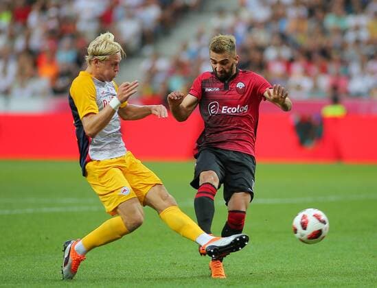 SOCCER - UEFA CL quali, RBS vs Shkendija SALZBURG,AUSTRIA,08.AUG.18 - SOCCER - UEFA Champions League, qualification, Red Bull Salzburg vs KF Shkendija. Image shows Xaver Schlager (RBS) and Mevlan Murati (Shkendija). GEPAxpictures xThomasxBachun