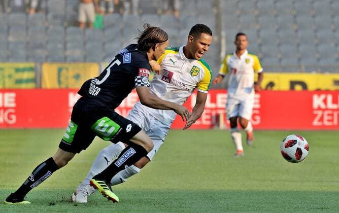 SOCCER - UEFA EL quali, Sturm vs Larnaca GRAZ,AUSTRIA,09.AUG.18 - SOCCER - UEFA Europa League qualification, SK Sturm Graz vs AEK Larnaca. Image shows Stefan Hierlaender (Sturm) and Acoran (Larnaca). GEPAxpictures xM.xOberlaender