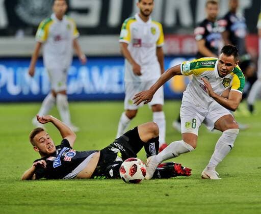 SOCCER - UEFA EL quali, Sturm vs Larnaca GRAZ,AUSTRIA,09.AUG.18 - SOCCER - UEFA Europa League qualification, SK Sturm Graz vs AEK Larnaca. Image shows Sandi Lovric (Sturm) and Acoran (Larnaca). GEPAxpictures xHansxOberlaender
