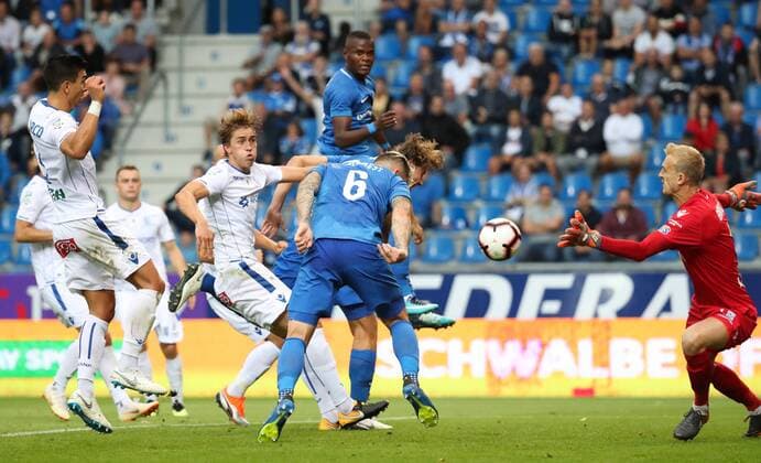 Genk s Sebastien Dewaest fights for the ball during a soccer game between Belgian team KRC Genk and Polish club Lech Poznan, Thursday 09 August 2018 in Genk, the first leg of the third qualification round for the Europa League competition. VIRGINIExLEFOUR  x05402270x