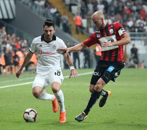 Tolgay Arslan (L) of Besiktas and Gernot Trauner of LASK Linz during the UEFA Europa League Qualifying match between Besiktas and LASK Linz at Vodafone Park in Istanbul , Turkey on August 09, 2018. 