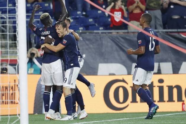 FOXBOROUGH, MA - AUGUST 11: New England Revolution midfielder Wilfried Zahibo (23) celebrates his goal during an MLS Fussball Herren USA match between the New England Revolution and the Philadelphia Union on August 11, 2018, at Gillette Stadium in Foxborough, Massachusetts. The Union defeated the Revolution 3-2. (Photo by Fred Kfoury III Icon Sportswire) SOCCER: AUG 11 MLS - Philadelphia Union at New England Revolution Icon482180811021 EDITORIAL USE ONLY
