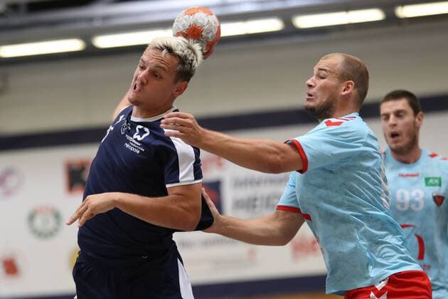 MHB - Montpellier vs. Fuechse Berlin, Handball, Internationaler Heide-Cup 2018, 12.08.18 Jean-Loup Faustin (Nr.25, MHB - Montpellier Handball) gegen Paul Drux (Fuechse Berlin, 95)
