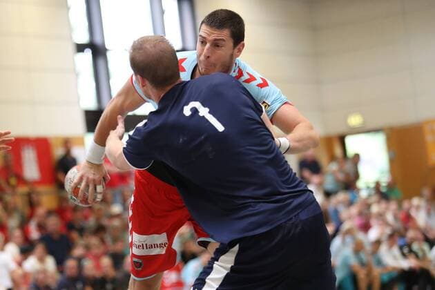 MHB - Montpellier vs. Fuechse Berlin, Handball, Internationaler Heide-Cup 2018, 12.08.18 Mijajlo Marsenic (Nr.93, Fuechse Berlin) gegen Jonas Truchanovicius (Nr.07, MHB - Montpellier Handball)
