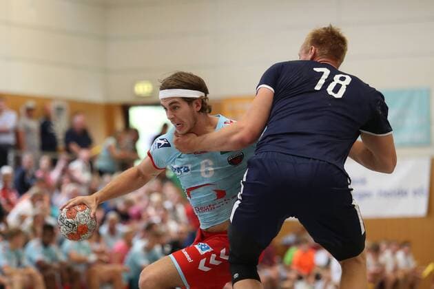 MHB - Montpellier vs. Fuechse Berlin, Handball, Internationaler Heide-Cup 2018, 12.08.18 Jacob Tandrup Holm (Nr.06, Fuechse Berlin) gegen Frederik Pettersson (Nr.18, MHB - Montpellier Handball)