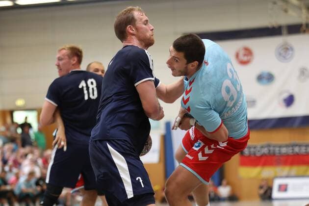 MHB - Montpellier vs. Fuechse Berlin, Handball, Internationaler Heide-Cup 2018, 12.08.18 Mijajlo Marsenic (Nr.93, Fuechse Berlin) gegen Jonas Truchanovicius (Nr.07, MHB - Montpellier Handball)