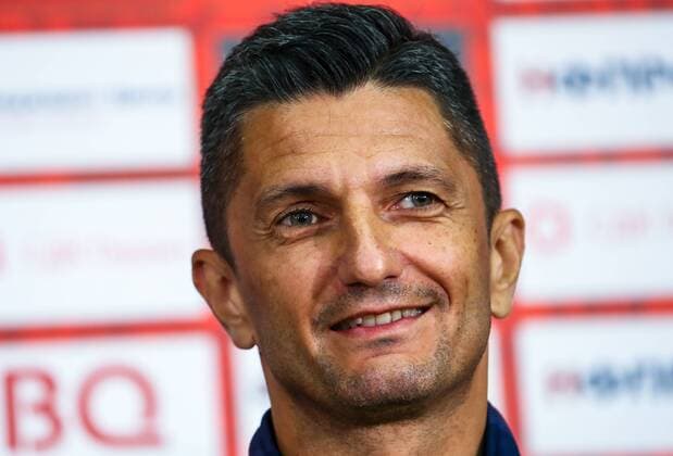 MOSCOW, RUSSIA - AUGUST 13, 2018: FC PAOK Thessaloniki s head coach Razvan Lucescu smiles during a press conference PK Pressekonferenz ahead of a UEFA Champions League qualifying round match against FC Spartak Moscow scheduled for August 14, 2018. Anton Novoderezhkin TASS  TS08CA54