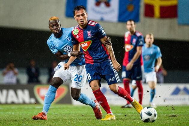 180814 Bonke Innocent of Malmö FF and Anel Hadzic of Vidi during the UEFA Champions League qualifying match between Vidi and Malmö FF on August 14, 2018 in Felcsut. Photo: Ludvig Thunman BILDBYRN kod LT 35516 Copyright: LUDVIGxTHUNMAN BB180814LT026