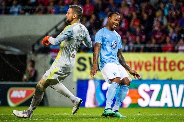 180814 Stefan Scepovic of Vidi against Carlos Strandberg of Malmö FF during the UEFA Champions League qualifying match between Vidi and Malmö FF on August 14, 2018 in Felcsut. Photo: Ludvig Thunman BILDBYRN kod LT 35516 Copyright: LUDVIGxTHUNMAN BB180814LT034