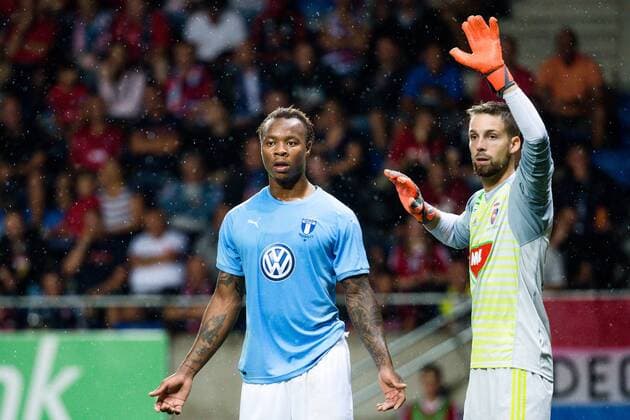 180814 Carlos Strandberg of Malmö FF and goalkeeper Stefan Scepovic of Vidi during the UEFA Champions League qualifying match between Vidi and Malmö FF on August 14, 2018 in Felcsut. Photo: Ludvig Thunman BILDBYRN kod LT 35516 Copyright: LUDVIGxTHUNMAN BB180814LT046