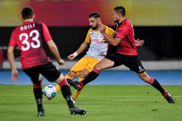 SOCCER - UEFA CL quali, Shkendija vs RBS SKOPJE,MACEDONIA,14.AUG.18 - SOCCER - UEFA Champions League, qualification, KF Shkendija vs Red Bull Salzburg. Image shows Munas Dabbur (RBS) and Visar Musliu (Shkendjia). GEPAxpictures xFlorianxErtl