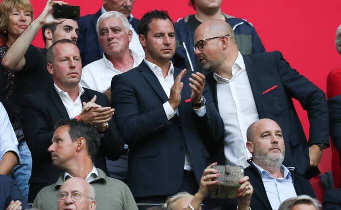 Standard s chairman Bruno Venanzi, Standard s sporting director Olivier Renard and Standard s Alexandre Grosjean pictured during a soccer game between Dutch club AFC Ajax and Belgian team Standard de Liege, Tuesday 14 August 2018 in Amsterdam, the Netherlands, the return leg of the third qualifying round of the UEFA Champions League. The first leg resulted in a 2-2 draw. VIRGINIExLEFOUR  x05405900x