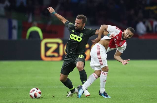 Standard s Orlando Sa and Ajax Zakaria Labyad fight for the ball during a soccer game between Dutch club AFC Ajax and Belgian team Standard de Liege, Tuesday 14 August 2018 in Amsterdam, the Netherlands, the return leg of the third qualifying round of the UEFA Champions League. The first leg resulted in a 2-2 draw. VIRGINIExLEFOUR  x05405929x