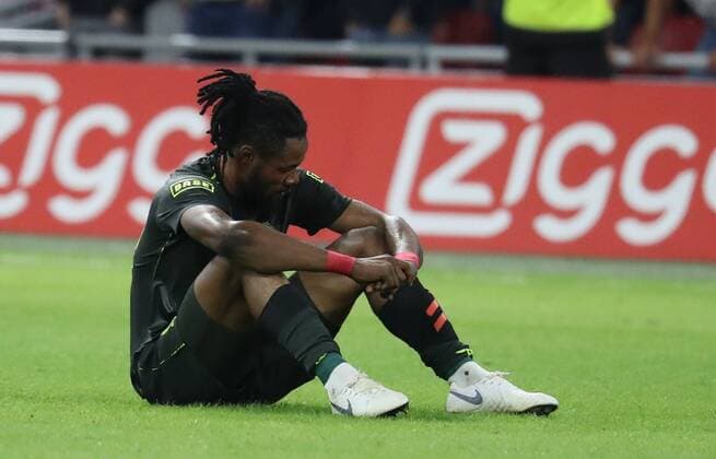 Standard s Christian Luyindama Nekadio looks dejected after a soccer game between Dutch club AFC Ajax and Belgian team Standard de Liege, Tuesday 14 August 2018 in Amsterdam, the Netherlands, the return leg of the third qualifying round of the UEFA Champions League. The first leg resulted in a 2-2 draw. VIRGINIExLEFOUR  x05405940x