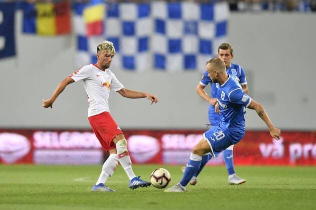 U Craiova 1984 Club Sportiv - RB Leipzig RB Leipzig s Kevin Kampl in action against Craiova s Matteo Fedele during UEFA Europa League 2018 2019, Third Qualifying Round, 2st leg match between U Craiova 1984 Club Sportiv vs RB Leipzig on Ion Oblemenco Stadium, Craiova Romania, 16 August 2018 Copyright: xAlexxNicodimx