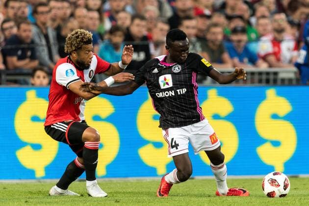 (L-R) Tonny Vilhena of Feyenoord, Abdul Zubairu of AS Trencin during the UEFA Europa League third round qualifying second leg match between Feyenoord Rotterdam and AS Trencin at De Kuip on August 16, 2018 in Rotterdam, The Netherlands UEFA Europa League 2018 2019 xVIxVIxImagesx xGerritxvanxKeulenxIVx 11791669