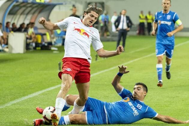 August 16, 2018: Marcel Sabitzer 7 of RB Leipzig and Marius Briceag 3 of Universitatea Craiova during the Soccer, UEFA Europa League qualifications, 3rd round, second leg, game between Universitatea Craiova (ROU) and RB Leipzig (GER) at Ion Oblemenco, Craiova, Romania ROU.  Copyright: xCatalinxSoarex crfcs16082018123650