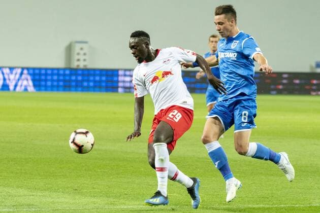 August 16, 2018: Jean-Kevin Augustin 29 of RB Leipzig and Alexandru Mateiu 8 of Universitatea Craiova during the Soccer, UEFA Europa League qualifications, 3rd round, second leg, game between Universitatea Craiova (ROU) and RB Leipzig (GER) at Ion Oblemenco, Craiova, Romania ROU.  Copyright: xCatalinxSoarex crfcs16082018123651