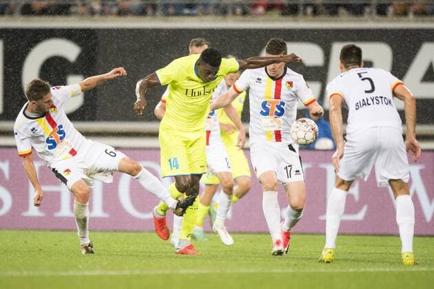 Jagiellonia s Taras Romanchuk and Gent s Taiwo Awoniyi fight for the ball during a soccer game between Belgian club KAA Gent and Polish team Jagiellonia Bialystok, Thursday 16 August 2018 in Gent, the return leg of the third qualification round for the Europa League competition. JASPERxJACOBS  x05407165x