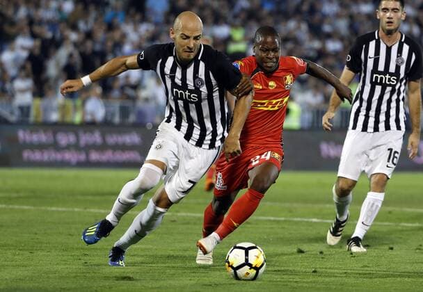 (180817) -- BELGRADE , Aug. 17, 2018 -- Partizan s Nemanja Miletic (L) vies with Nordsjaelland s (C) Jonathan Amon during UEFA Europa League third qualifying round, 2nd leg football match between Partizan and Nordsjaelland in Belgrade, Serbia on Aug. 16, 2018. Partizan won 3-2. ) (SP)SERBIA-BELGRADE-FOOTBALL-UEFA-EUROPA LEAGUE-QUALIFICATIONS PredragxMilosavljevic 