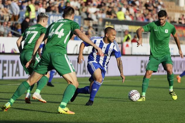 Nikolai Alho of HJK and from left Stefan Savic, Dino Stiglec and Rok Kronaveter of Olimpja Ljubljana during UEFA Europa League Third Qualifying Round second match HJK Helsinki vs Olimpja Ljubljana at Telia 5G Stadium in Helsinki Finland on 16th August 2018. Matti Raivio All Over Press XXKEIKKAXX  MR021175