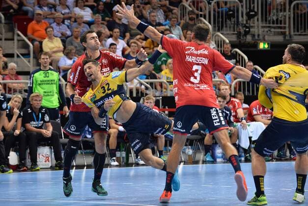Handball Pixum Super Cup SG Flensburg Handewitt - Rhein-Neckar Löwen am 22.08.2018 im ISS Dome in Düsseldorf v.l.n.r.: Rasmus Lauge ( Flensburg ), Alexander Petersson ( Rhein-Neckar Löwen ), Tobias Karlsson ( Flensburg ), Jannik Kohlbacher ( Rhein-Neckar Löwen )