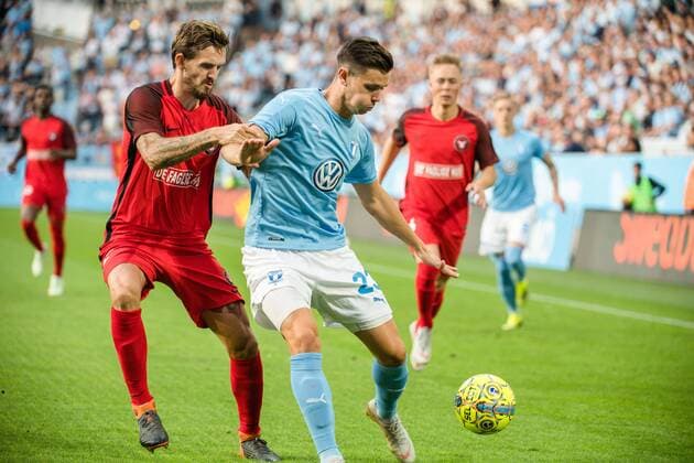 Fußball, EL Quali, Malmö FF - FC Midtjylland 180823 Marcus Antonsson of Malmö FF and of Midtjylland Kian Hansen of Midtjylland during the UEFA Europa League qualifying match between Malmö FF and Midtjylland on August 23, 2018 in Malmö. Photo: Ludvig Thunman BILDBYRN kod LT 35525 Copyright: LUDVIGxTHUNMAN BB180823LT006