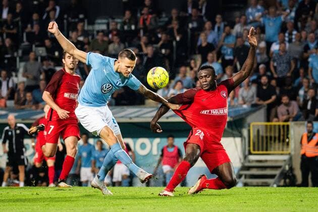 180823 Arn?r Ingvi Traustason of Malmö FF and Bubacarr Sanneh of Midtjylland during the UEFA Europa League qualifying match between Malmö FF and Midtjylland on August 23, 2018 in Malmö. Photo: Ludvig Thunman BILDBYRN kod LT 35525 Copyright: LUDVIGxTHUNMAN BB180823LT063