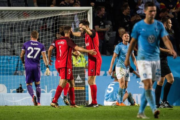 180823 Marc Dal Hende of Midtjylland celebrates the 2-2 goal behind goalkeeper Johan Dahlin of Malmö FF during the UEFA Europa League qualifying match between Malmö FF and Midtjylland on August 23, 2018 in Malmö. Photo: Ludvig Thunman BILDBYRN kod LT 35525 Copyright: LUDVIGxTHUNMAN BB180823LT067