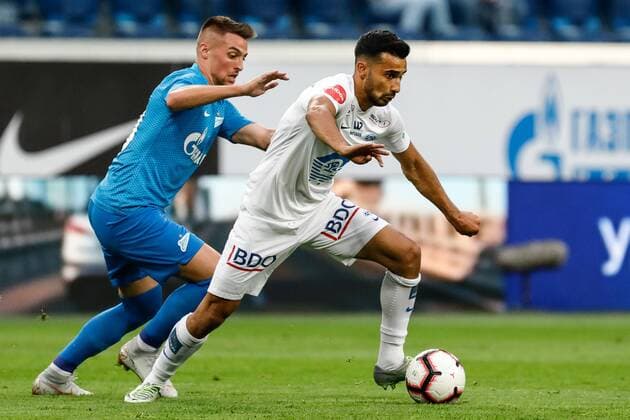 August 23, 2018 - Saint Petersburg, Russia - Robert Mak (L) of FC Zenit Saint Petersburg and Etzaz Hussain of Molde FK vie for the ball during the UEFA Europa League play-offs first leg match between FC Zenit Saint Petersburg and Molde FK on August 23, 2018 at Saint Petersburg Stadium in Saint Petersburg, Russia. Zenit Saint Petersburg v Molde FK - UEFA Europa League: Play-offs  - ZUMAn230 20180823_zaa_n230_130 Copyright: xMikexKireevx