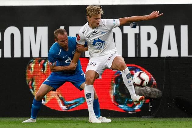 August 23, 2018 - Saint Petersburg, Russia - Aleksandr Anyukov (L) of FC Zenit Saint Petersburg and Erling Braut Haland of Molde FK vie for the ball during the UEFA Europa League play-offs first leg match between FC Zenit Saint Petersburg and Molde FK on August 23, 2018 at Saint Petersburg Stadium in Saint Petersburg, Russia. Zenit Saint Petersburg v Molde FK - UEFA Europa League: Play-offs  - ZUMAn230 20180823_zaa_n230_171 Copyright: xMikexKireevx