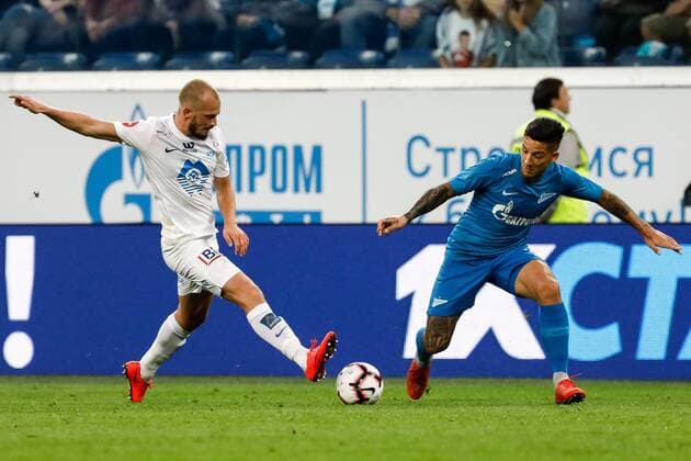 August 23, 2018 - Saint Petersburg, Russia - Sebastian Driussi (R) of FC Zenit Saint Petersburg and Eirik Hestad of Molde FK vie for the ball during the UEFA Europa League play-offs first leg match between FC Zenit Saint Petersburg and Molde FK on August 23, 2018 at Saint Petersburg Stadium in Saint Petersburg, Russia. Zenit Saint Petersburg v Molde FK - UEFA Europa League: Play-offs  - ZUMAn230 20180823_zaa_n230_177 Copyright: xMikexKireevx